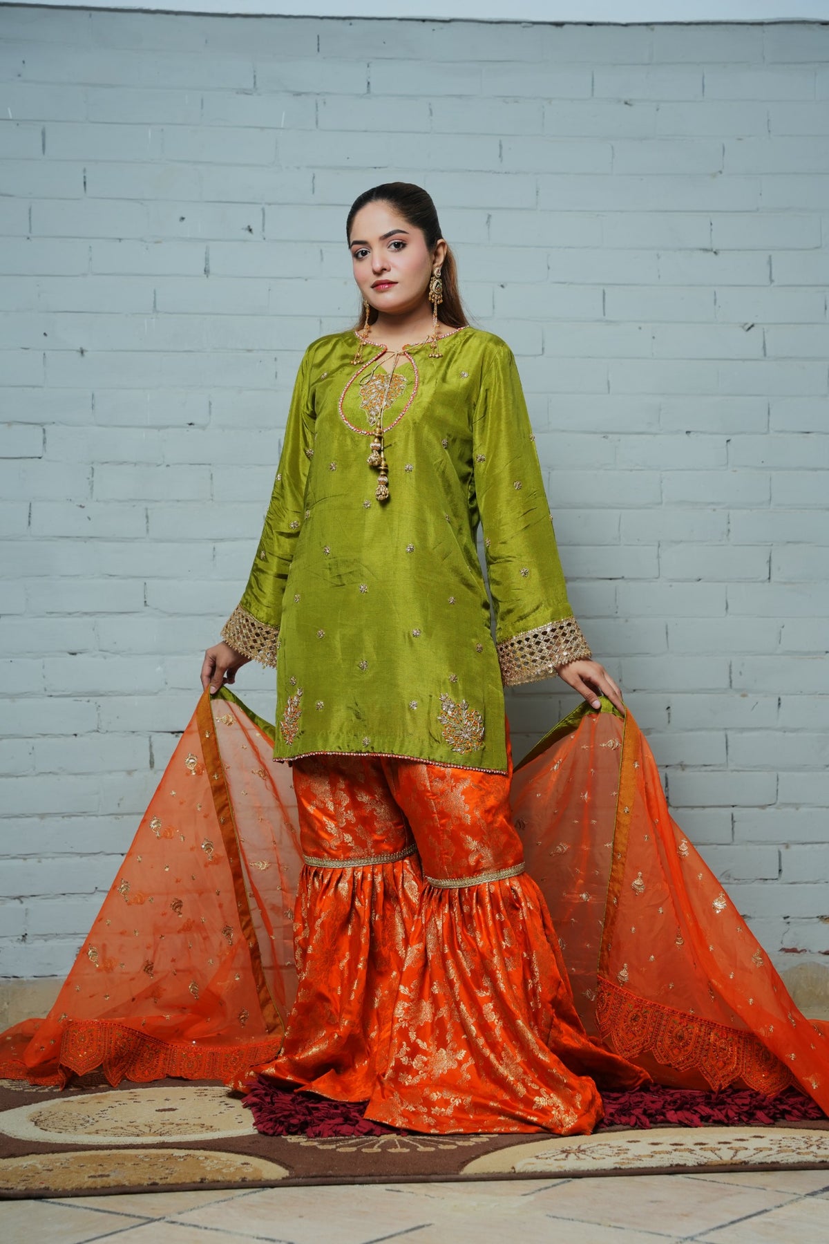 Green tassel silk shirt, orange Banarsi gharara and orange organza dupatta — view 8