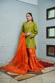 Green tassel silk shirt, orange Banarsi gharara and orange organza dupatta — view 1