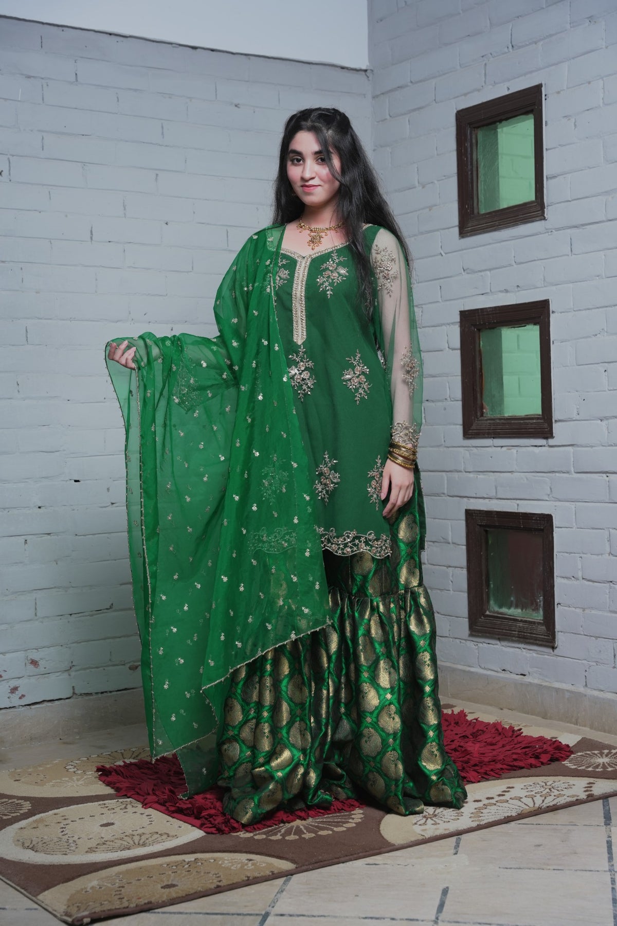 Full front view of green shirt, Banarsi gharara and organza dupatta