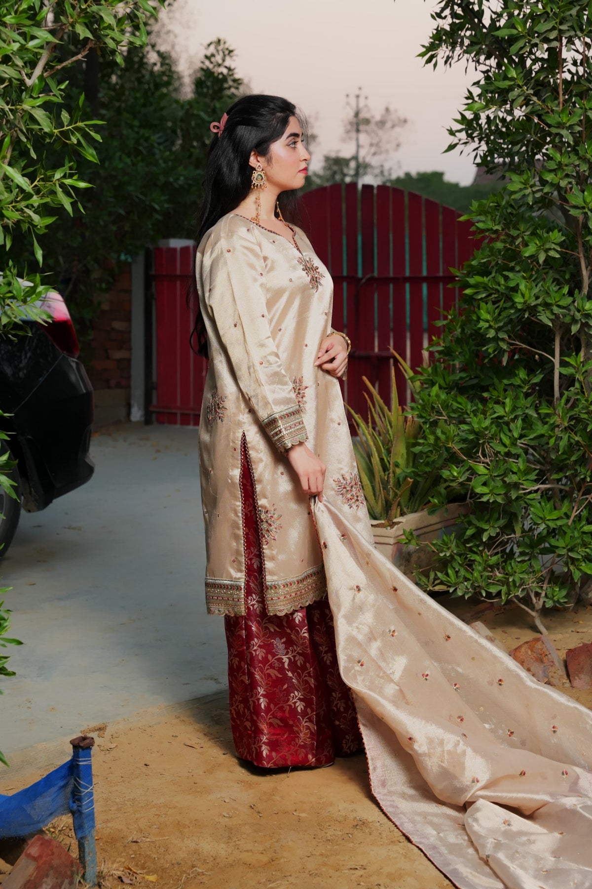 Golden and red embroidered outfit — view 3