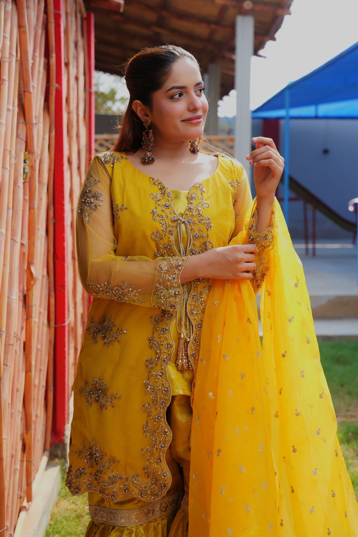 Urooj yellow net gown and Banarsi gharara set — front embroidery detail