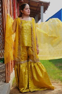 Urooj yellow net gown and Banarsi gharara set — inner shirt and gharara